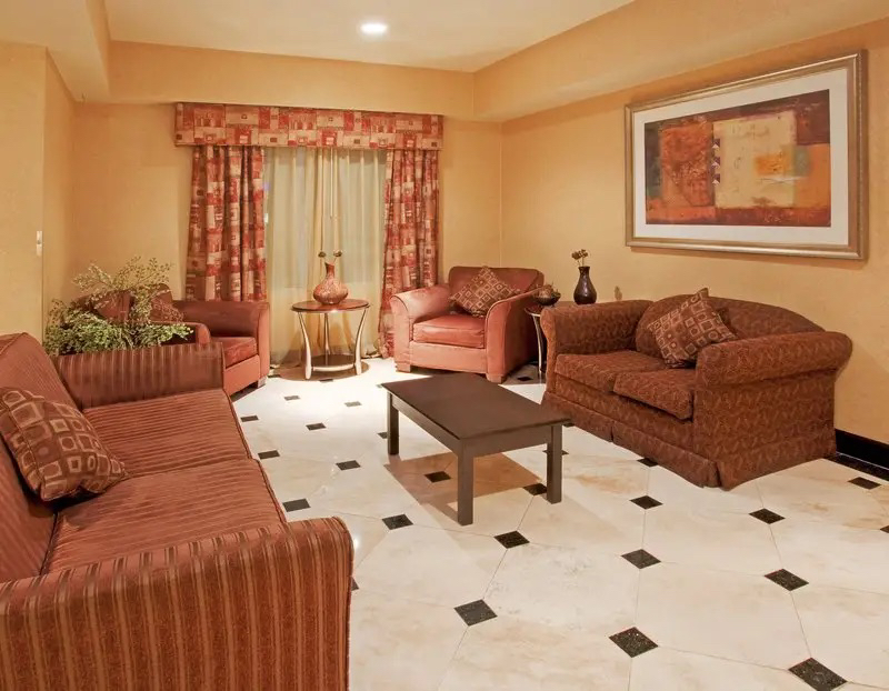 Hotel living room with white marble tiled floor